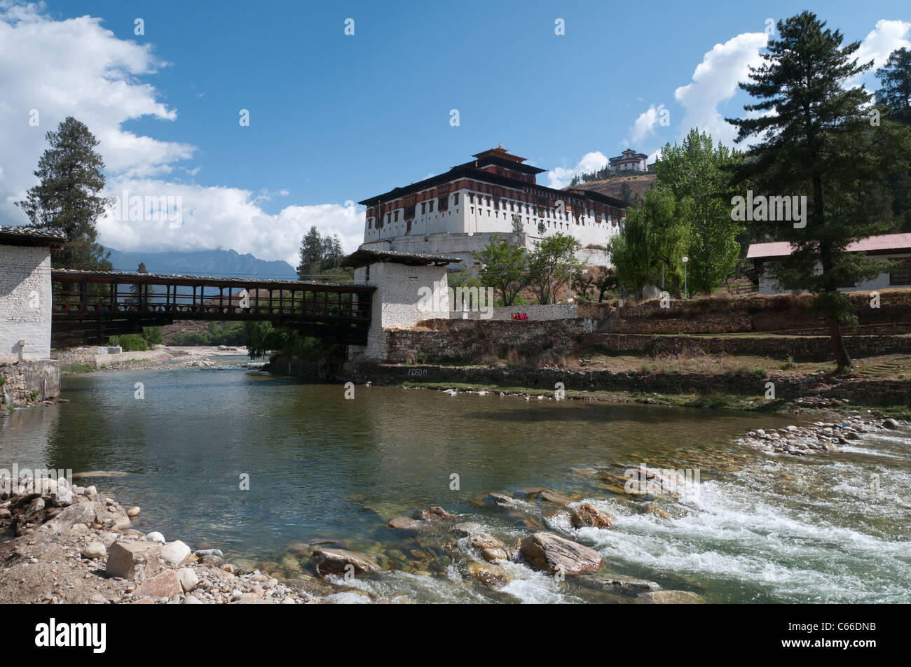 view of Paro dzong with bridge and river. paro. bhutan Stock Photo