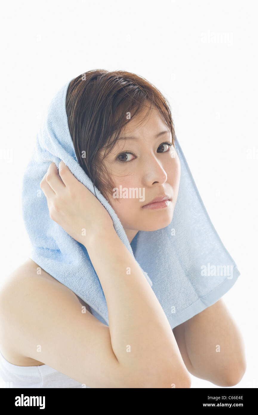 Woman Drying Hair with Towel Stock Photo Alamy