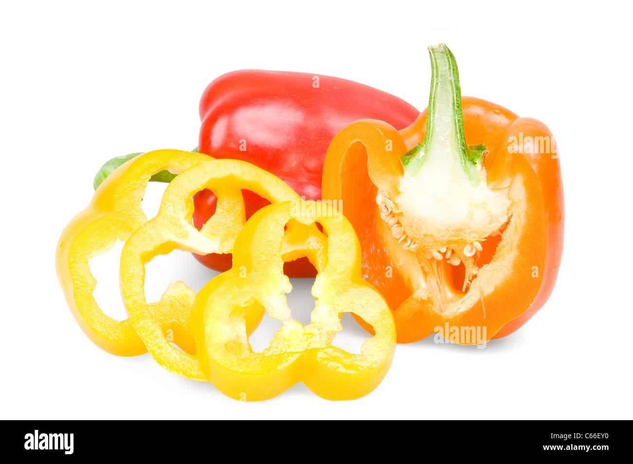 Red, yellow and orange bell peppers isolated on white Stock Photo - Alamy