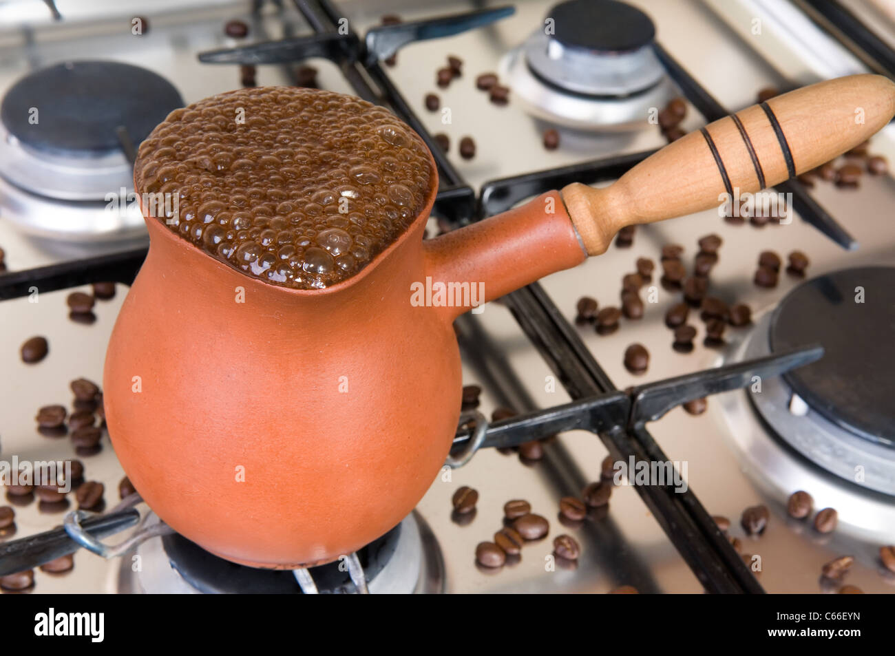 Turkish Coffee Pot With Boiling Coffee On An Old Electric Stove. Stock  Photo, Picture and Royalty Free Image. Image 38066992.