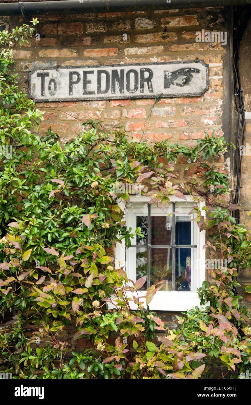 old road sign to Pednor on the side of a building in Chesham old town Bucks UK Stock Photo