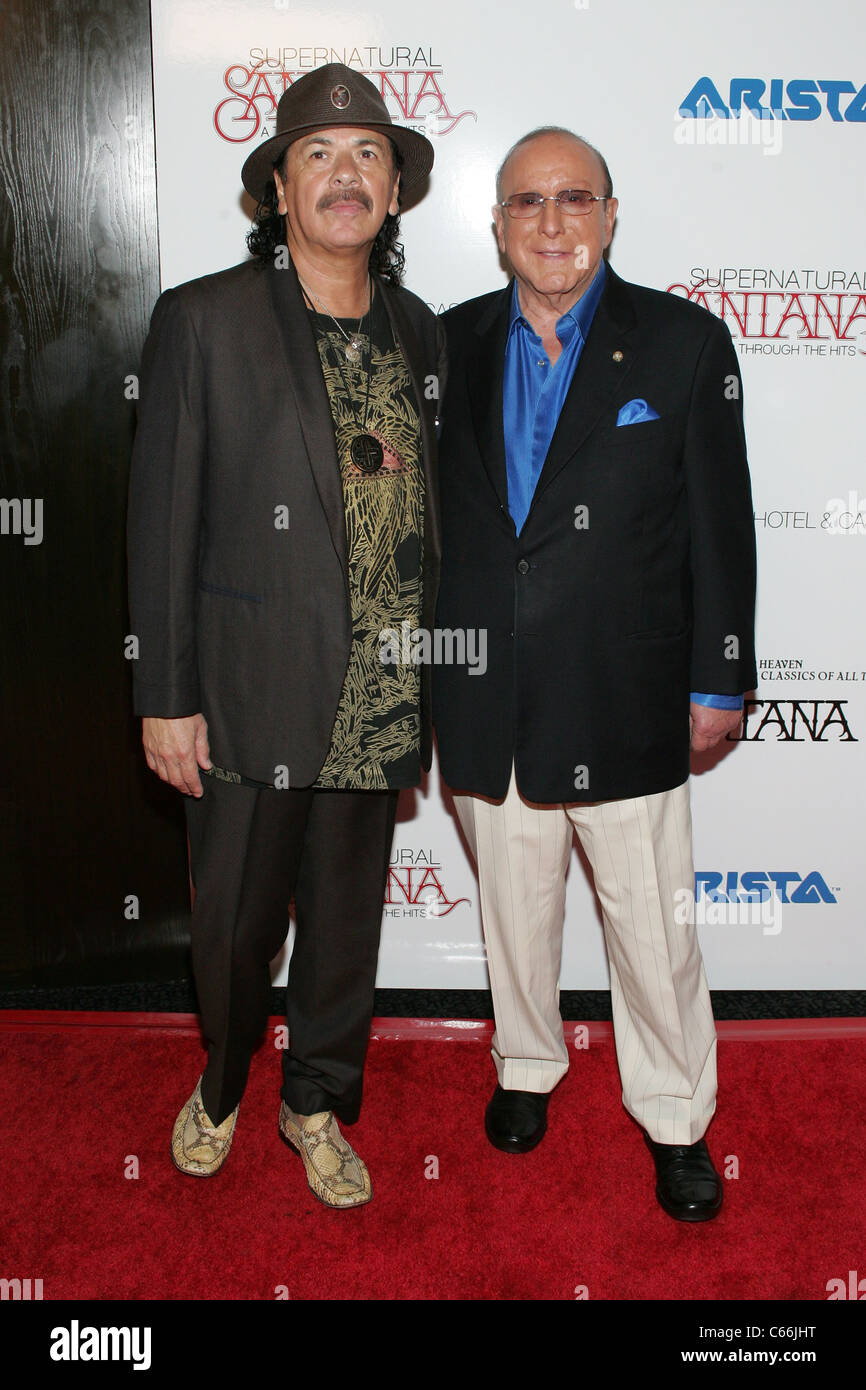 Carlos Santana, Clive Davis in attendance for Guitar Heaven...The Greatest Guitar Classics of All Time Album Release Party, Vanity Nightclub, Hard Rock Hotel and Casino, Las Vegas, NV August 25, 2010. Photo By: James Atoa/Everett Collection Stock Photo