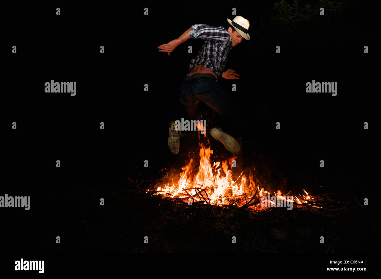 Man jumping over campfire hires stock photography and images Alamy