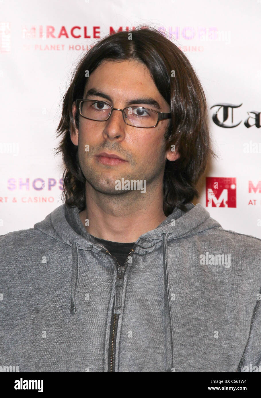 Rob Bourdon in attendance for Linkin Park Autograph Signing at Club Tattoo, Miracle Mile Shops at Planet Hollywood Resort and Casino, Las Vegas, NV February 19, 2011. Photo By: MORA/Everett Collection Stock Photo