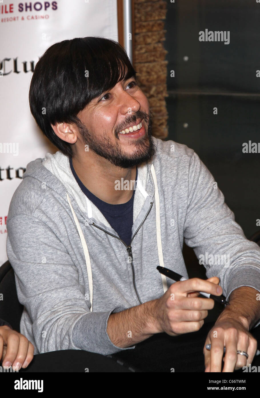 Mike Shinoda in attendance for Linkin Park Autograph Signing at Club Tattoo, Miracle Mile Shops at Planet Hollywood Resort and Casino, Las Vegas, NV February 19, 2011. Photo By: MORA/Everett Collection Stock Photo
