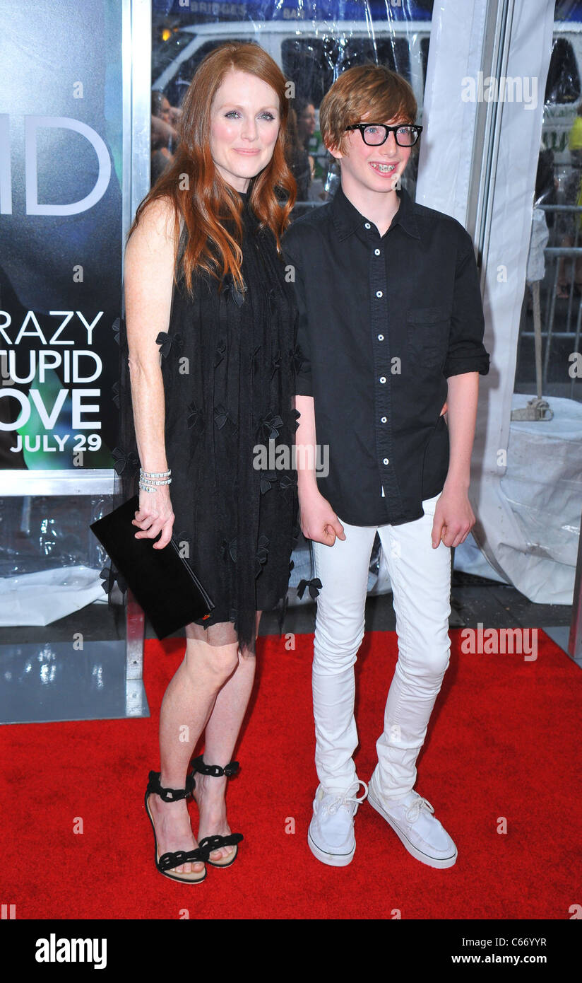 Julianne Moore, son Caleb Freundlich at arrivals for Crazy, Stupid, Love. Premiere, The Ziegfeld Theatre, New York, NY July 19, 2011. Photo By: Gregorio T. Binuya/Everett Collection Stock Photo