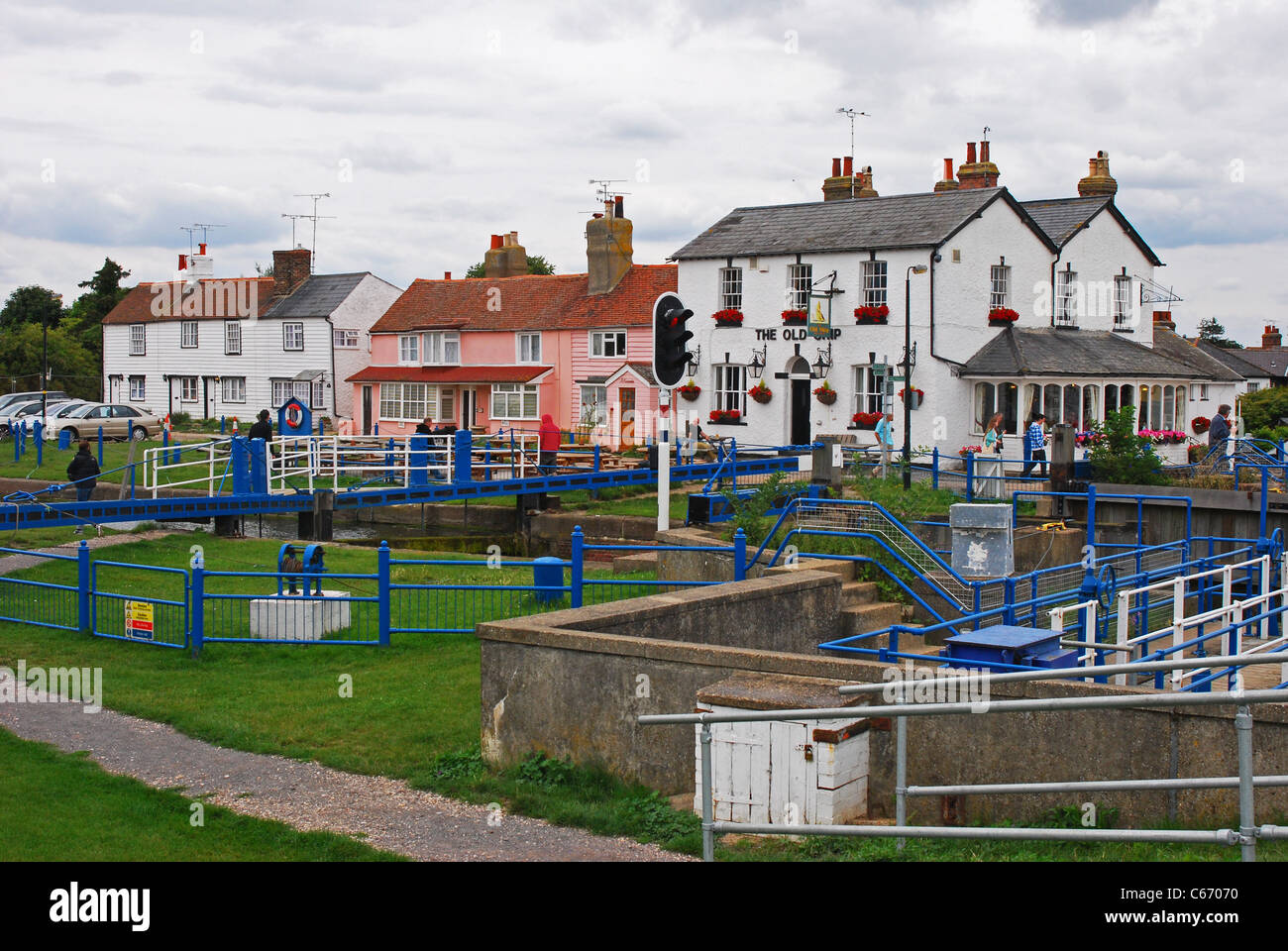 Houses pub and lock at Heybridge Basin Essex England Stock Photo