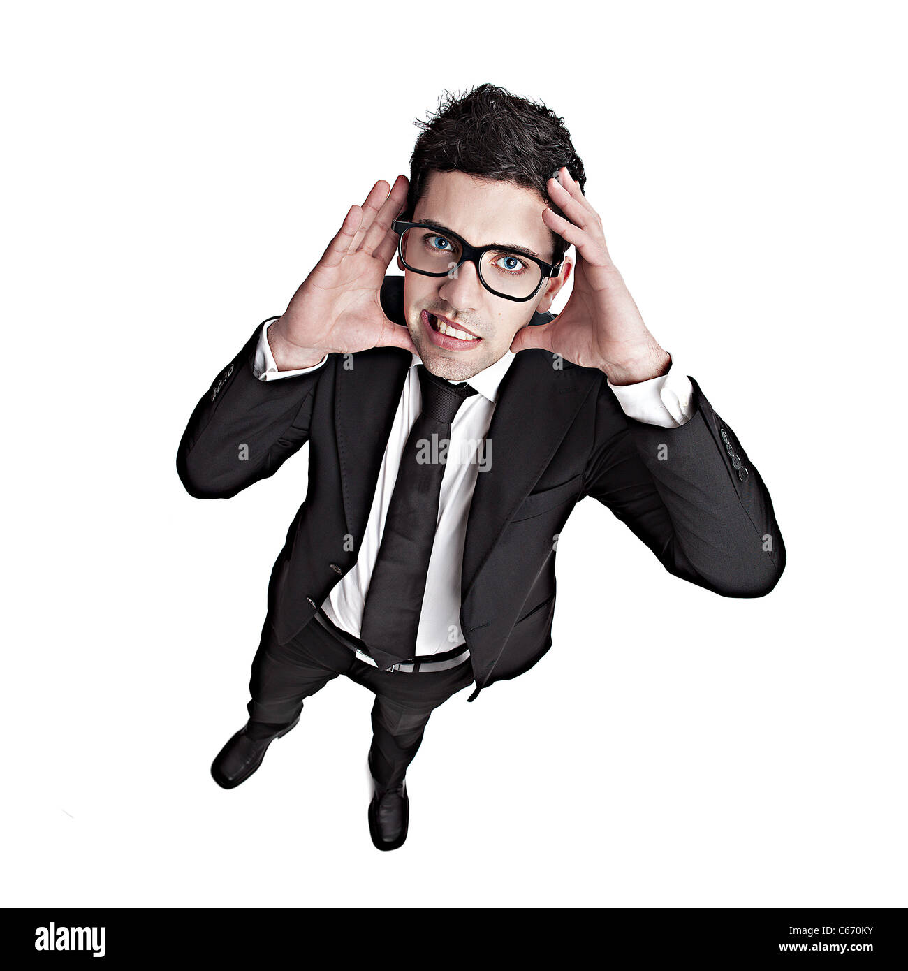 Funny portrait of a young businessman with a nerd glasses Stock Photo