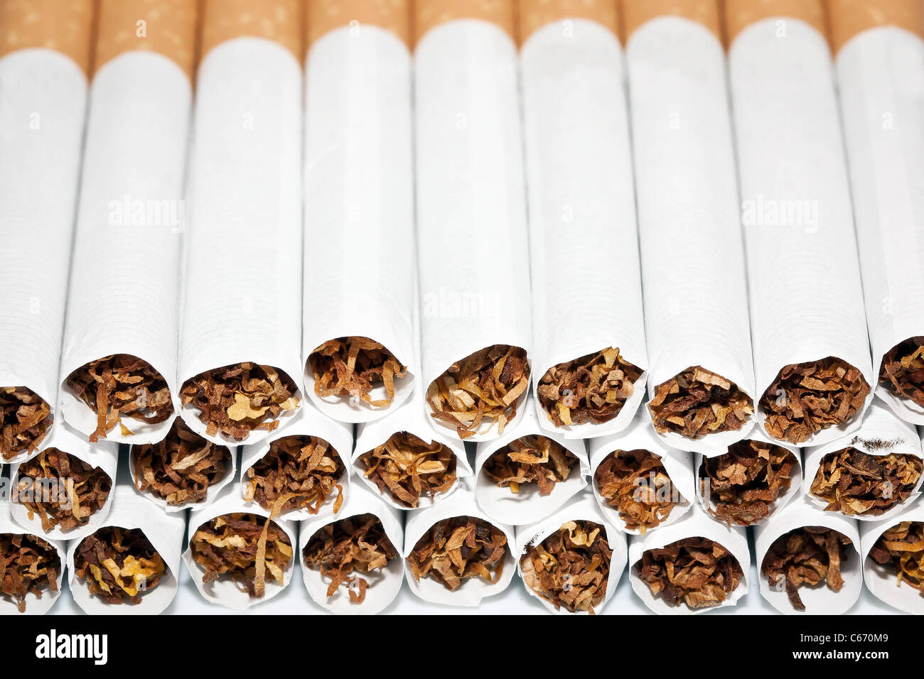 Close up of a smoking cigarettes in a stack Stock Photo
