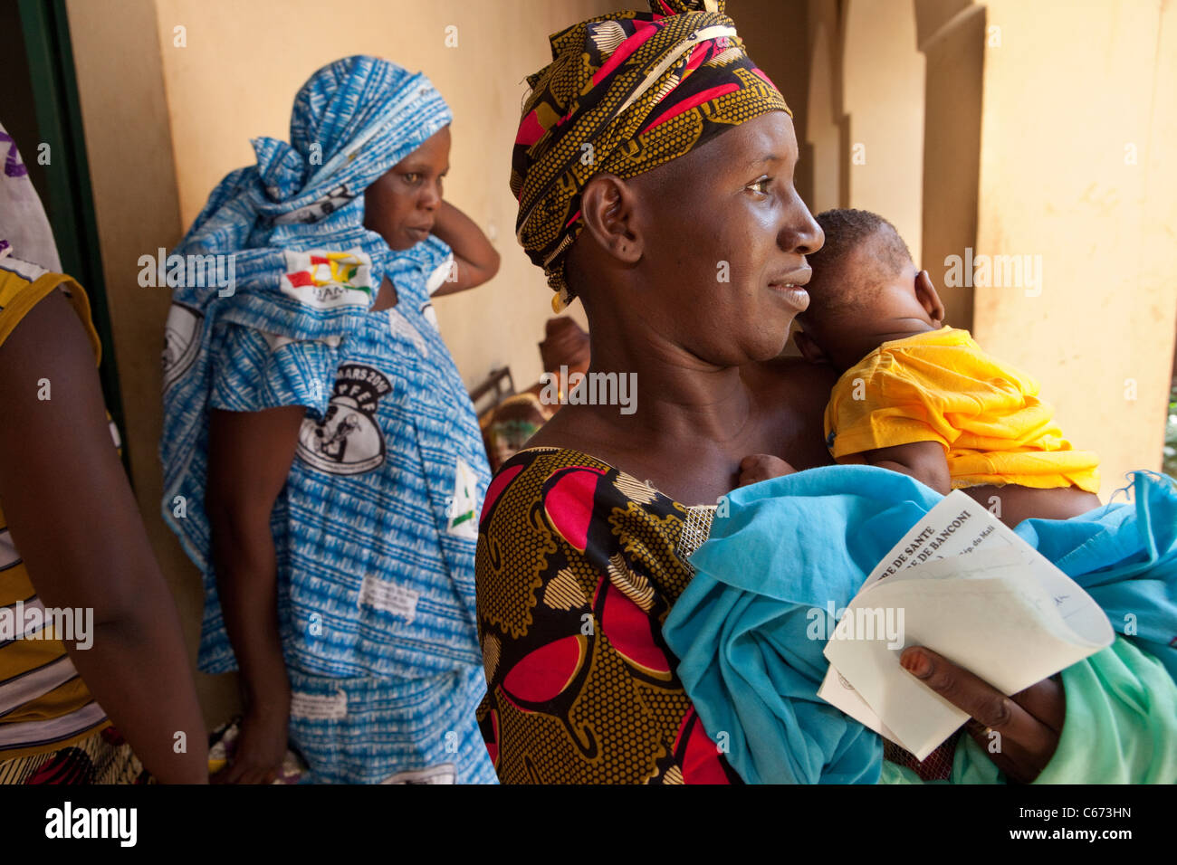 Women wait outside a health clinic in Bamako, Mali, West Africa. Stock Photo