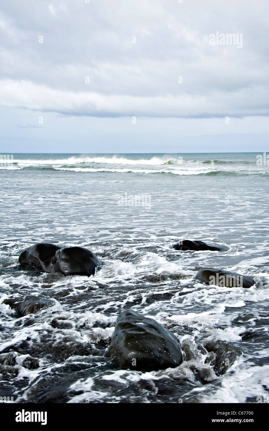 The Black Volcanic Beach and Rocky Shore on the South Taranaki Bight by