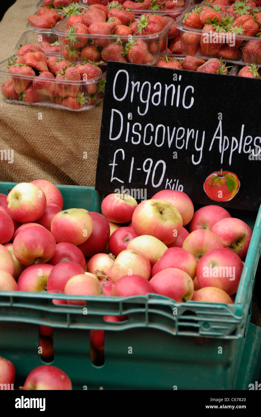 Organic apples on a market stall Stock Photo