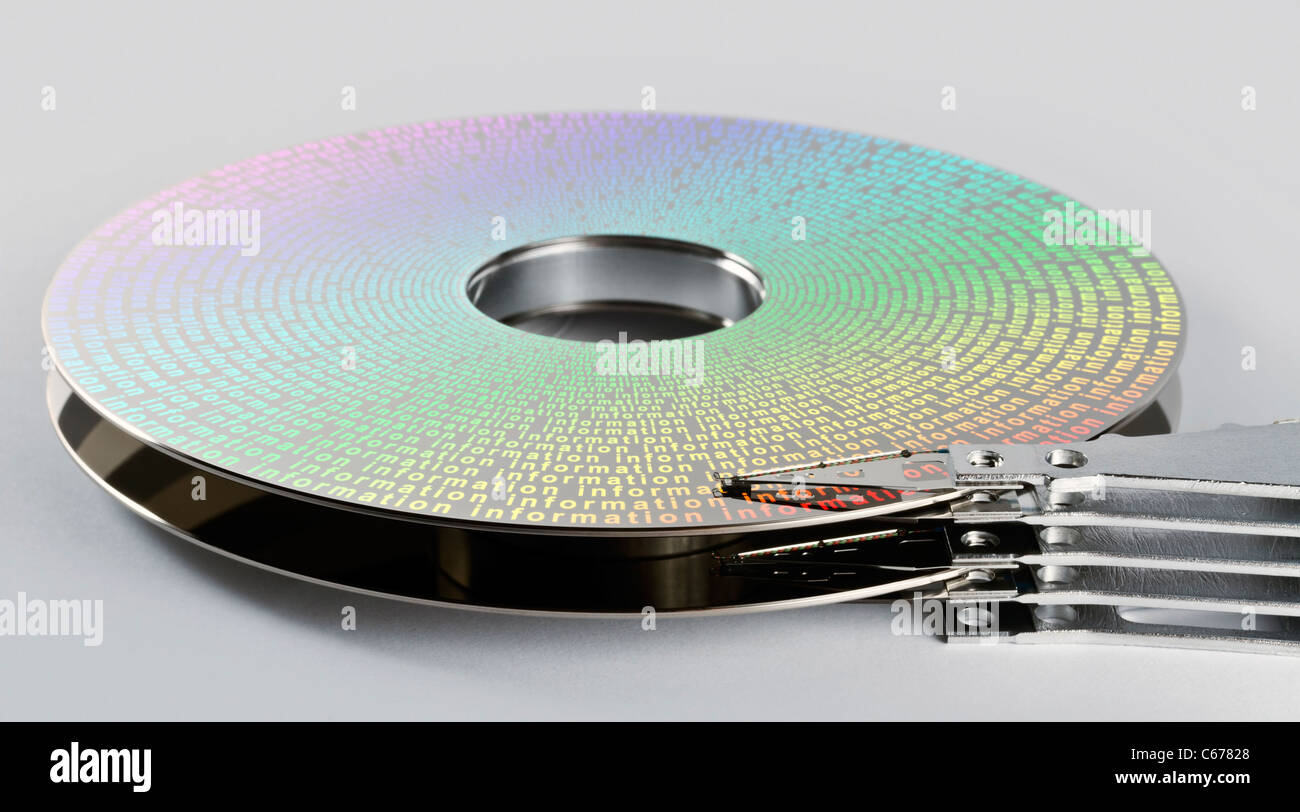 parts of hard disk drive in grey background with symbolized information ...