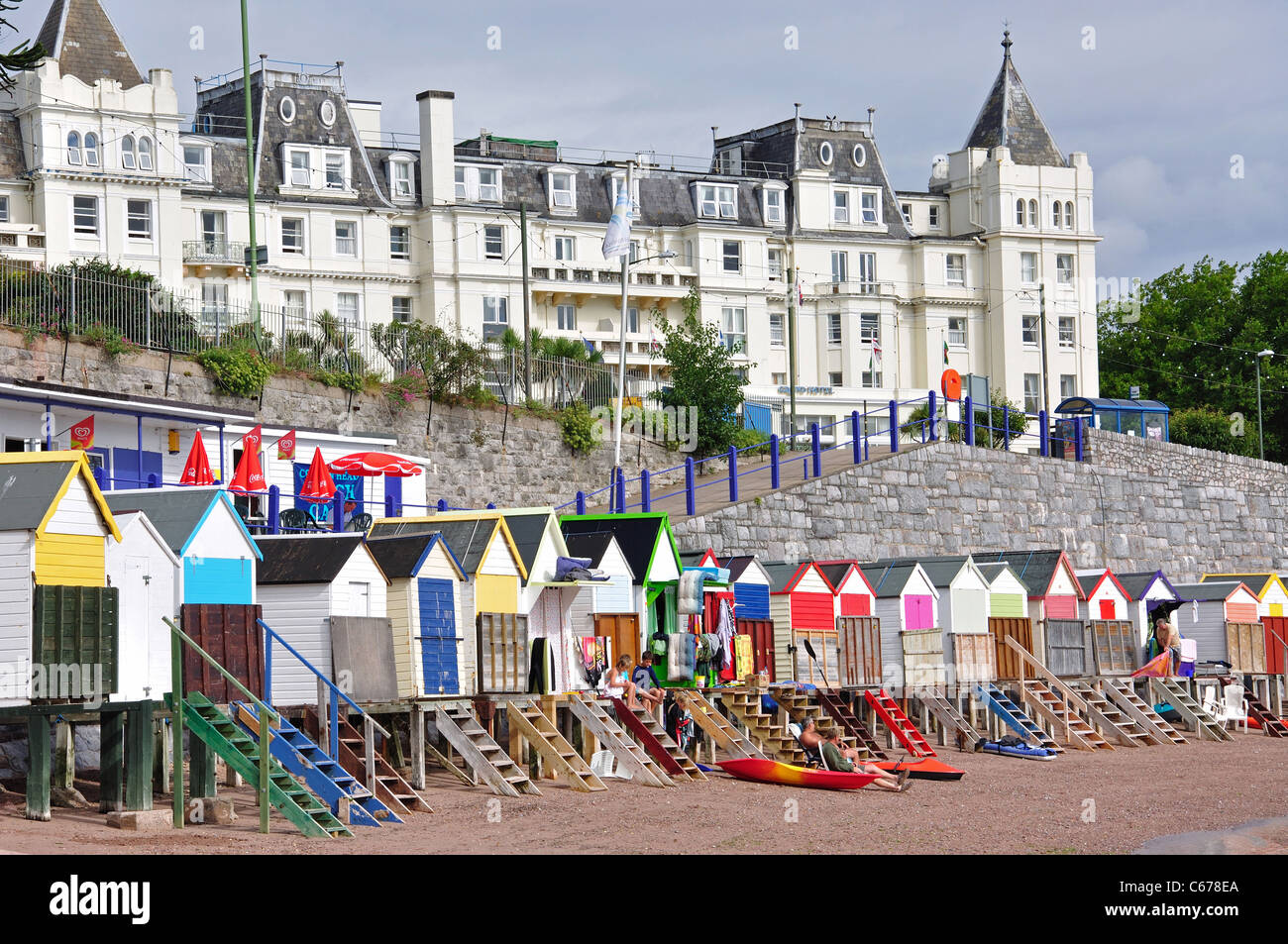 Colourful beach huts and Grand Hotel, Corbyn's Beach, Torquay, Tor Bay, Devon, England, United Kingdom Stock Photo