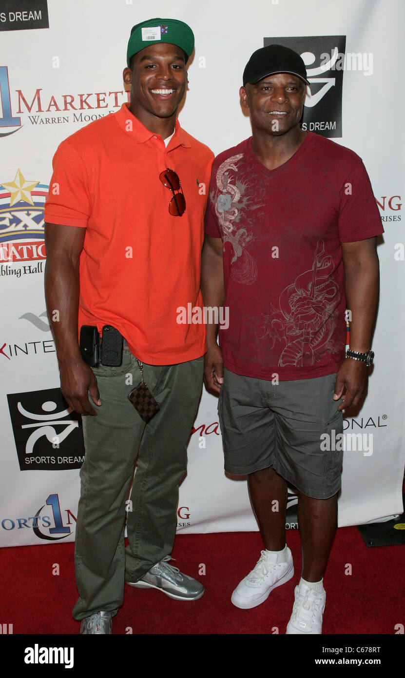 Cam Newton, Warren Moon in attendance for Sports Dream Bowl Benefit for Urban Youth Scholarship Fund, Texas Station, North Las Vegas, NV June 25, 2011. Photo By: James Atoa/Everett Collection Stock Photo