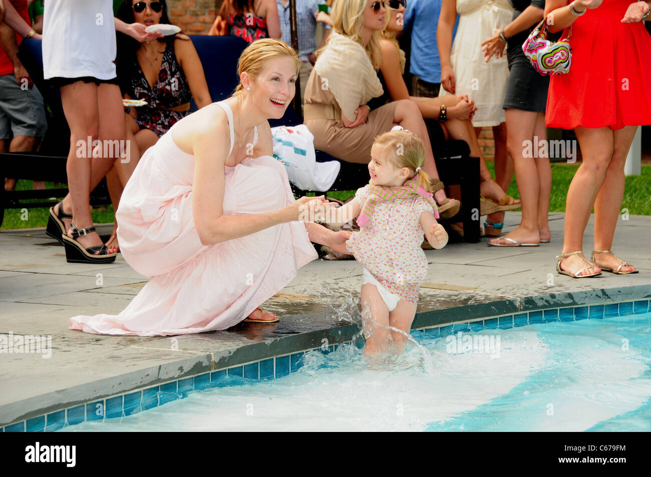 Kelly Rutherford, Helena Rutherford in attendance for Lacoste and EMM(01)