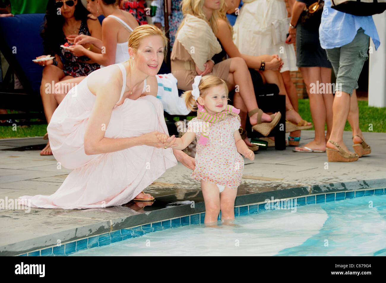 Kelly Rutherford, Helena Rutherford in attendance for Lacoste and EMM