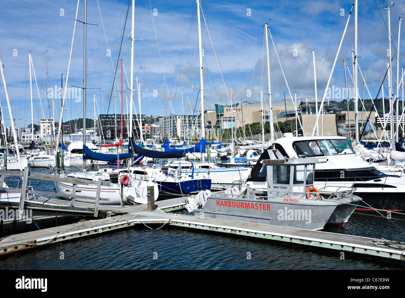 Ocean Going Yachts Boats Motor and Crusiers Moored in Chaffers Marina by Oriental Bay Wellington North Island New Zealand NZ Stock Photo