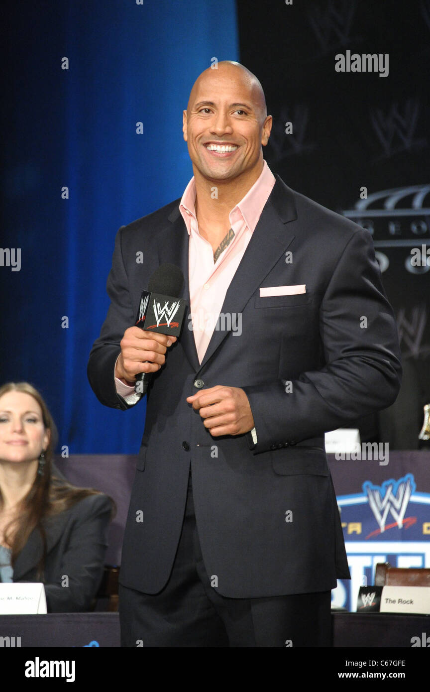 Dwayne The Rock Johnson, John Cena in attendance for WRESTLEMANIA XXVII  Press Conference, Hard Rock Cafe, New York, NY March 30, 2011. Photo By:  Rob Rich/Everett Collection Stock Photo - Alamy