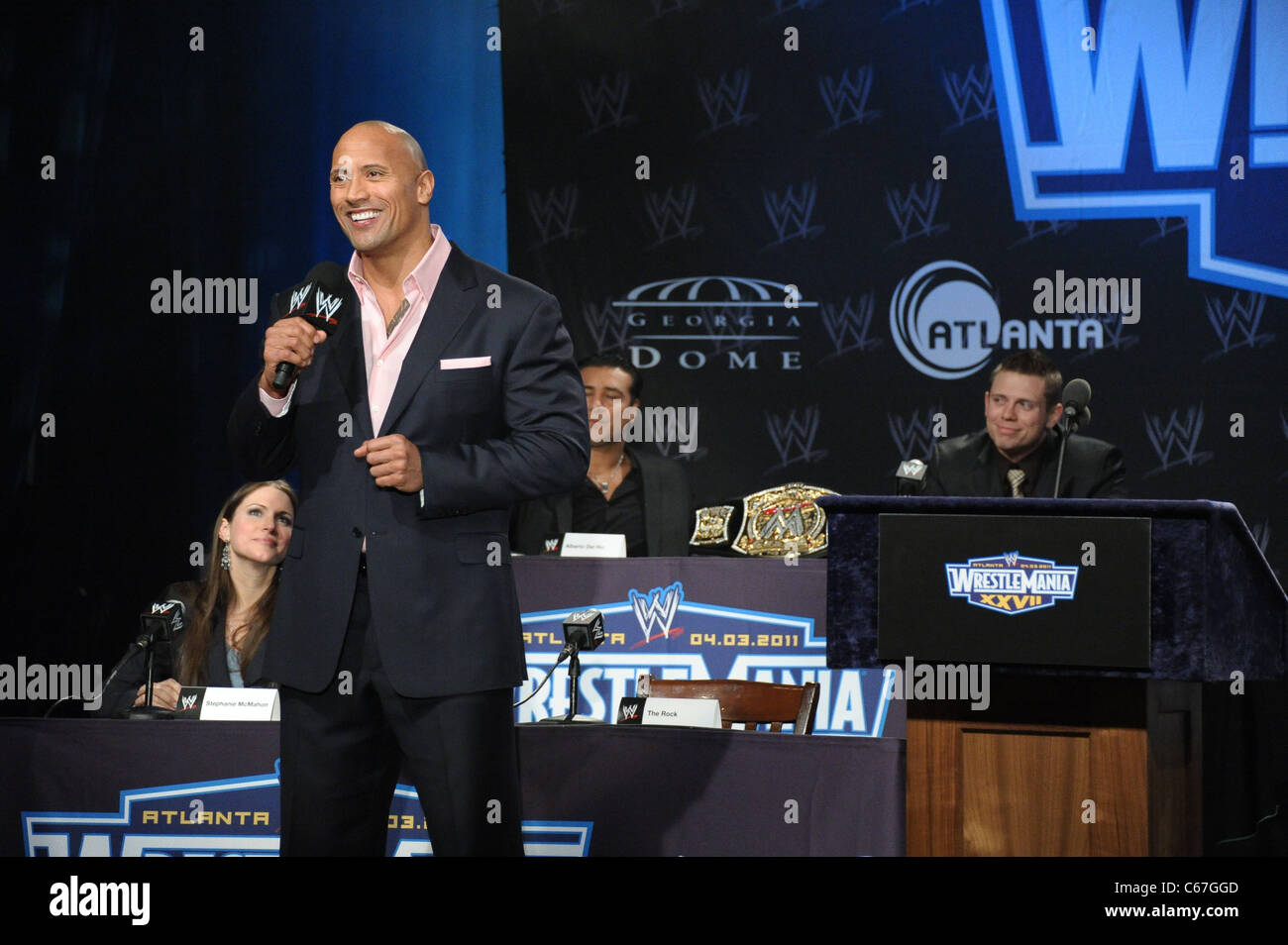 Dwayne The Rock Johnson, John Cena in attendance for WRESTLEMANIA XXVII  Press Conference, Hard Rock Cafe, New York, NY March 30, 2011. Photo By:  Rob Rich/Everett Collection Stock Photo - Alamy