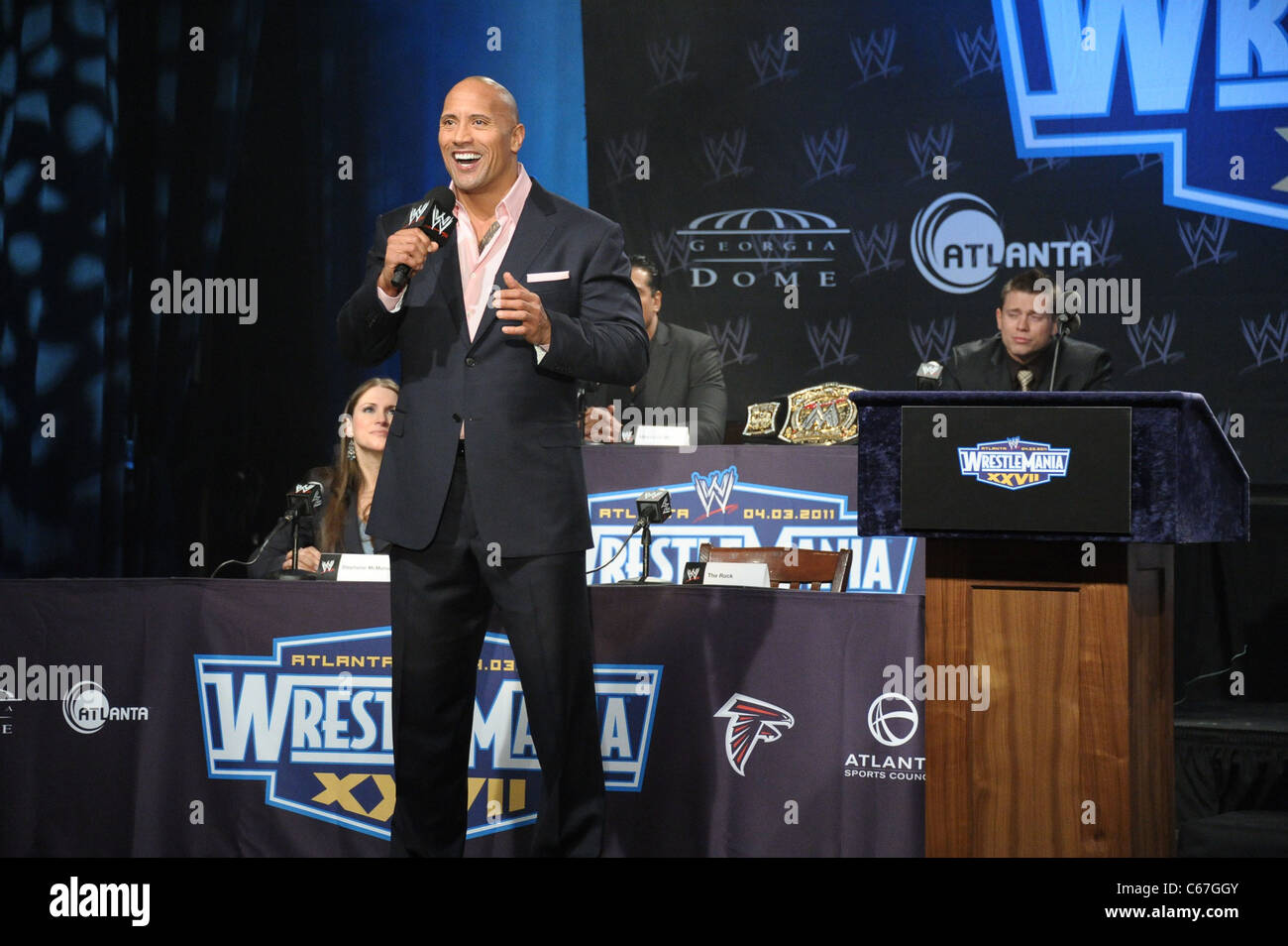 Dwayne The Rock Johnson, John Cena in attendance for WRESTLEMANIA XXVII  Press Conference, Hard Rock Cafe, New York, NY March 30, 2011. Photo By:  Rob Rich/Everett Collection Stock Photo - Alamy