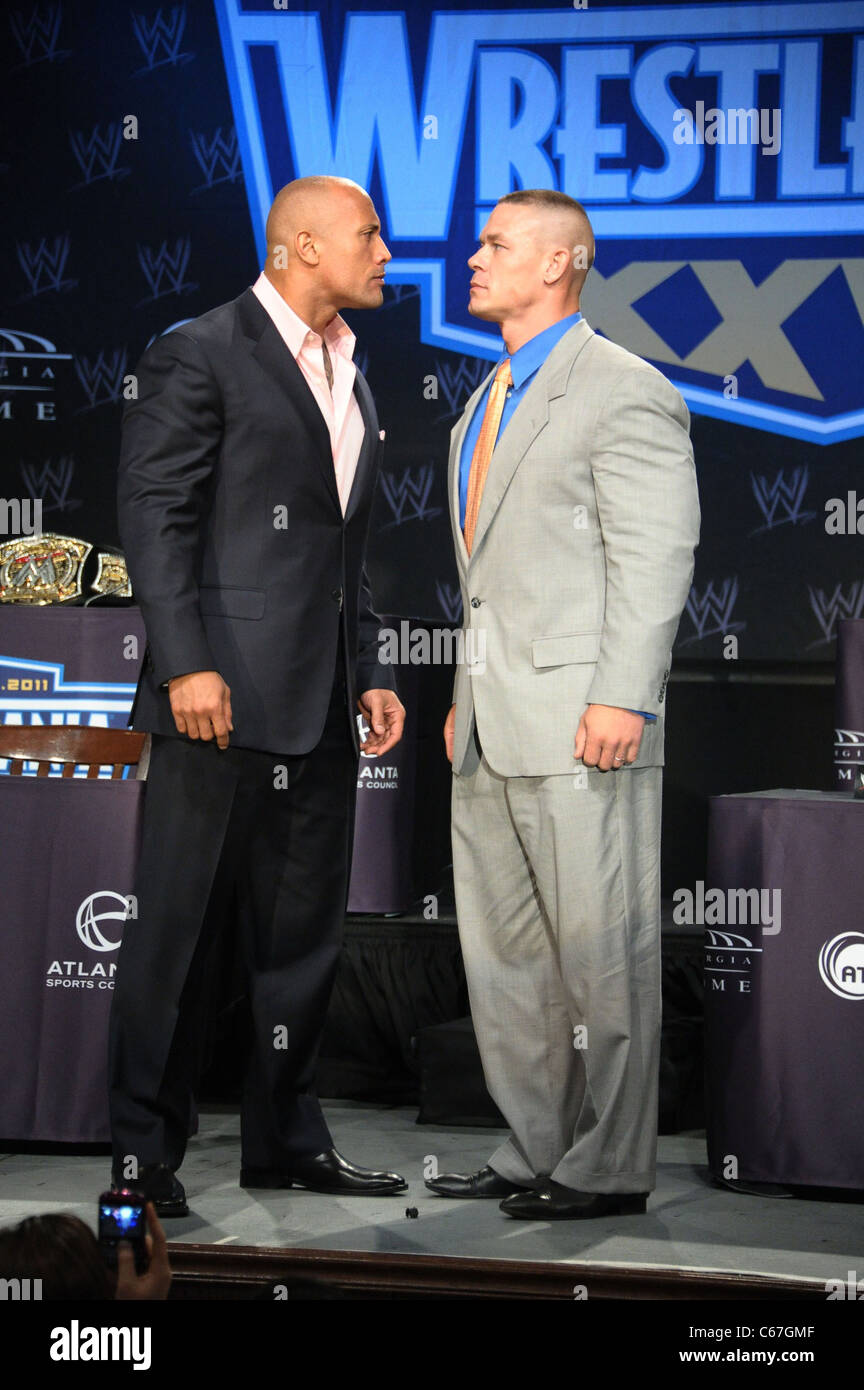 Dwayne The Rock Johnson, John Cena in attendance for WRESTLEMANIA XXVII  Press Conference, Hard Rock Cafe, New York, NY March 30, 2011. Photo By:  Rob Rich/Everett Collection Stock Photo - Alamy