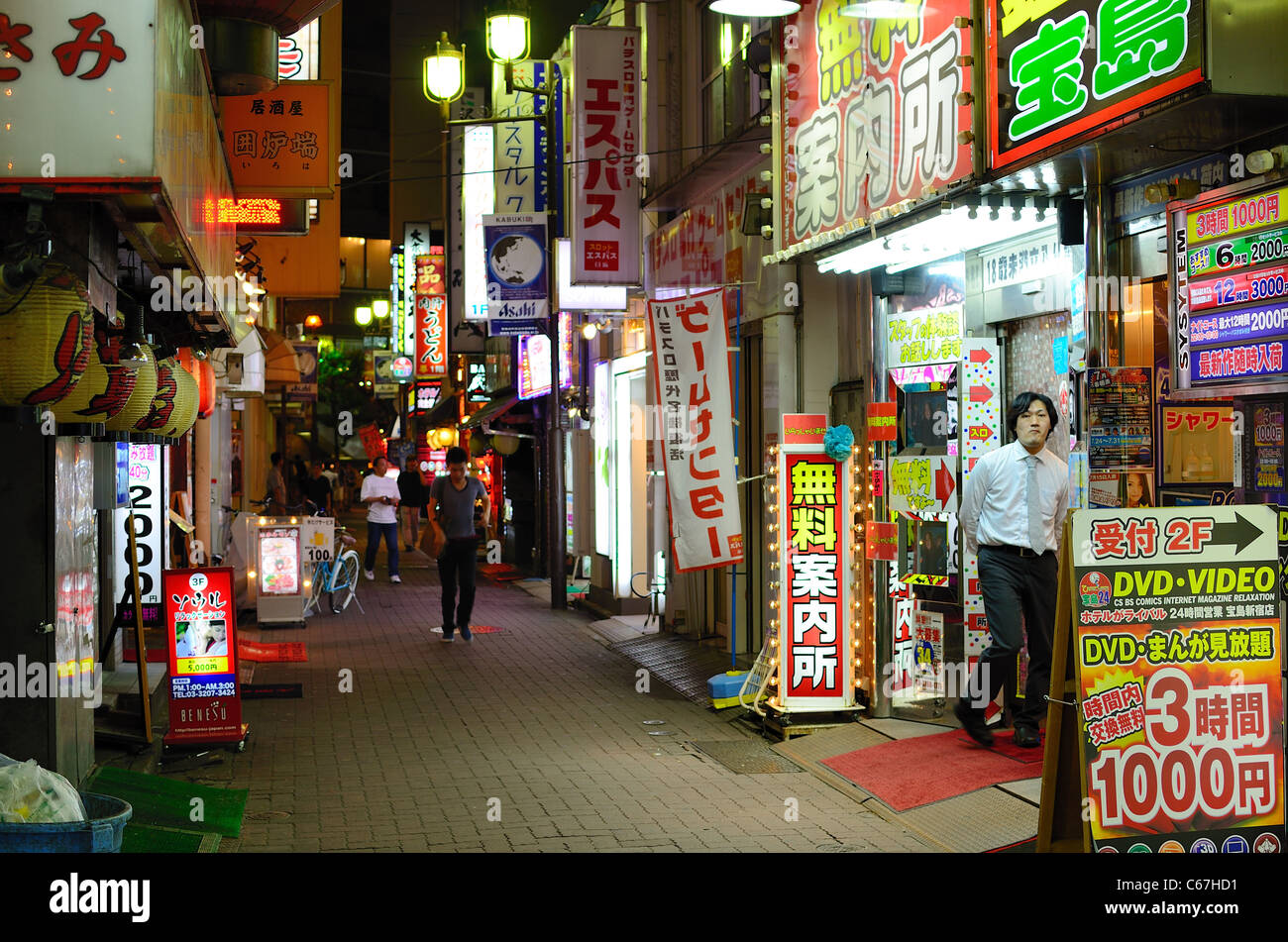 Alleyway in Kabuki-cho, Tokyo, Japan Stock Photo