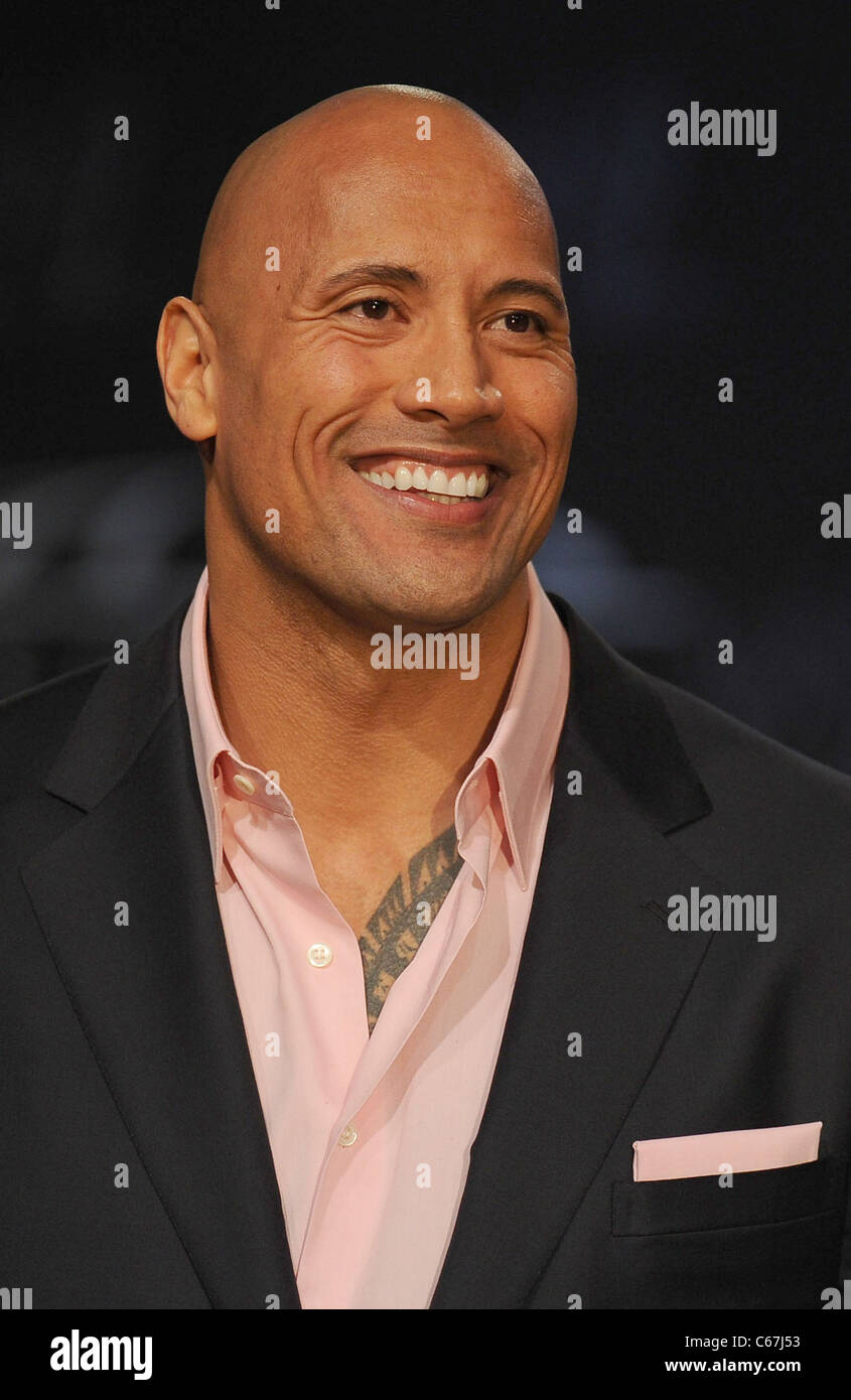 Dwayne The Rock Johnson, John Cena in attendance for WRESTLEMANIA XXVII  Press Conference, Hard Rock Cafe, New York, NY March 30, 2011. Photo By:  Rob Rich/Everett Collection Stock Photo - Alamy