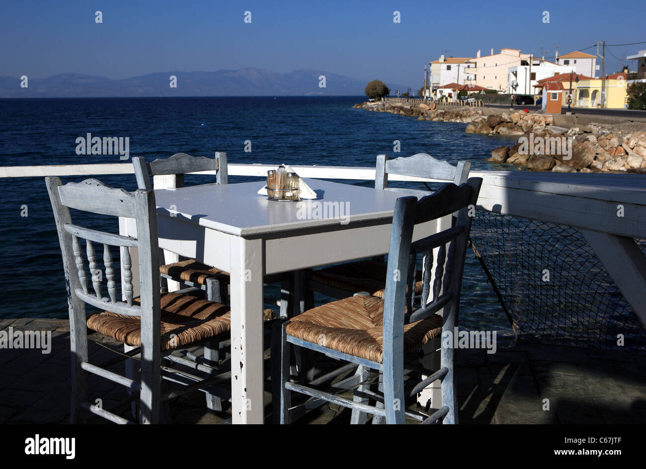 Greek restaurant table and chairs in the town of Lygia in the
