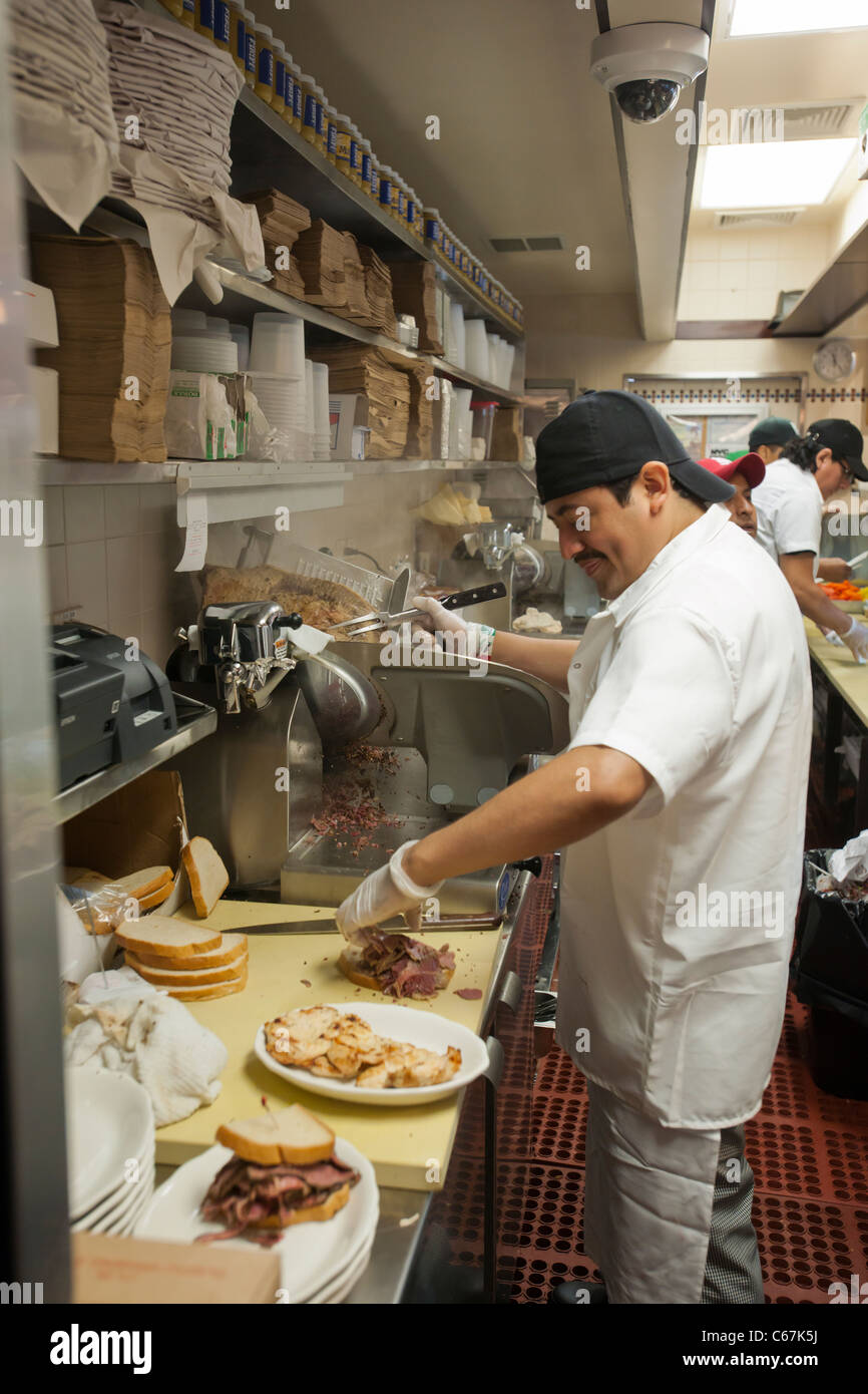Countermen at work at the grand opening of the famed 2nd Avenue Deli