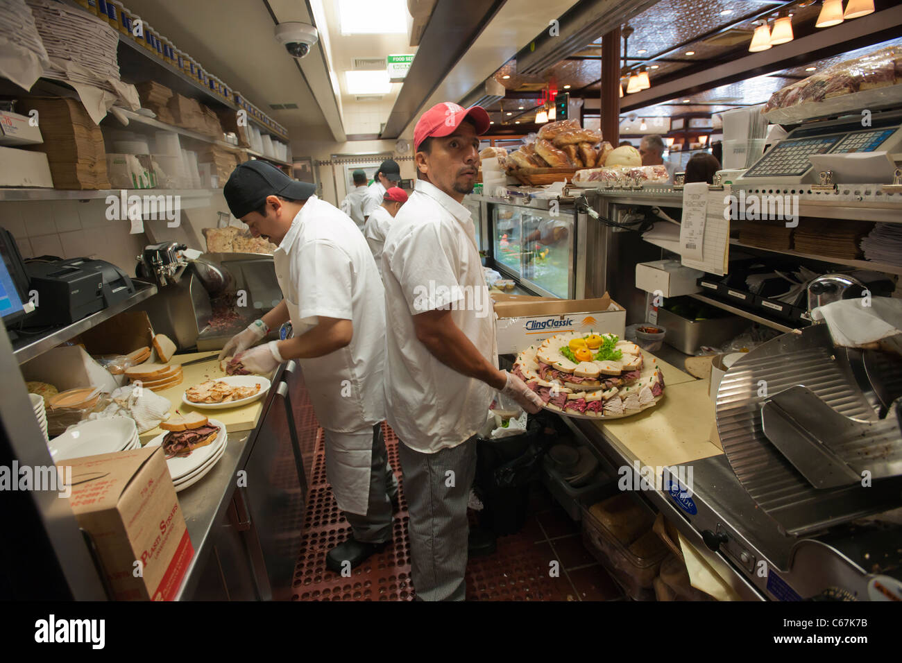 Countermen at work at the grand opening of the famed 2nd Avenue Deli
