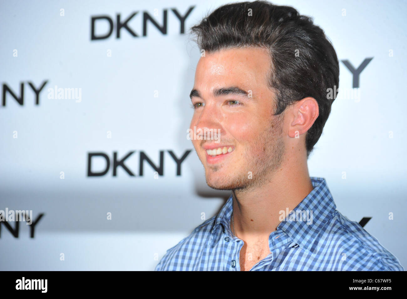 Kevin Jonas at arrivals for DKNY Sunglass Soiree at The Beach, Dream Downtown, New York, NY July 26, 2011. Photo By: Gregorio T. Binuya/Everett Collection Stock Photo