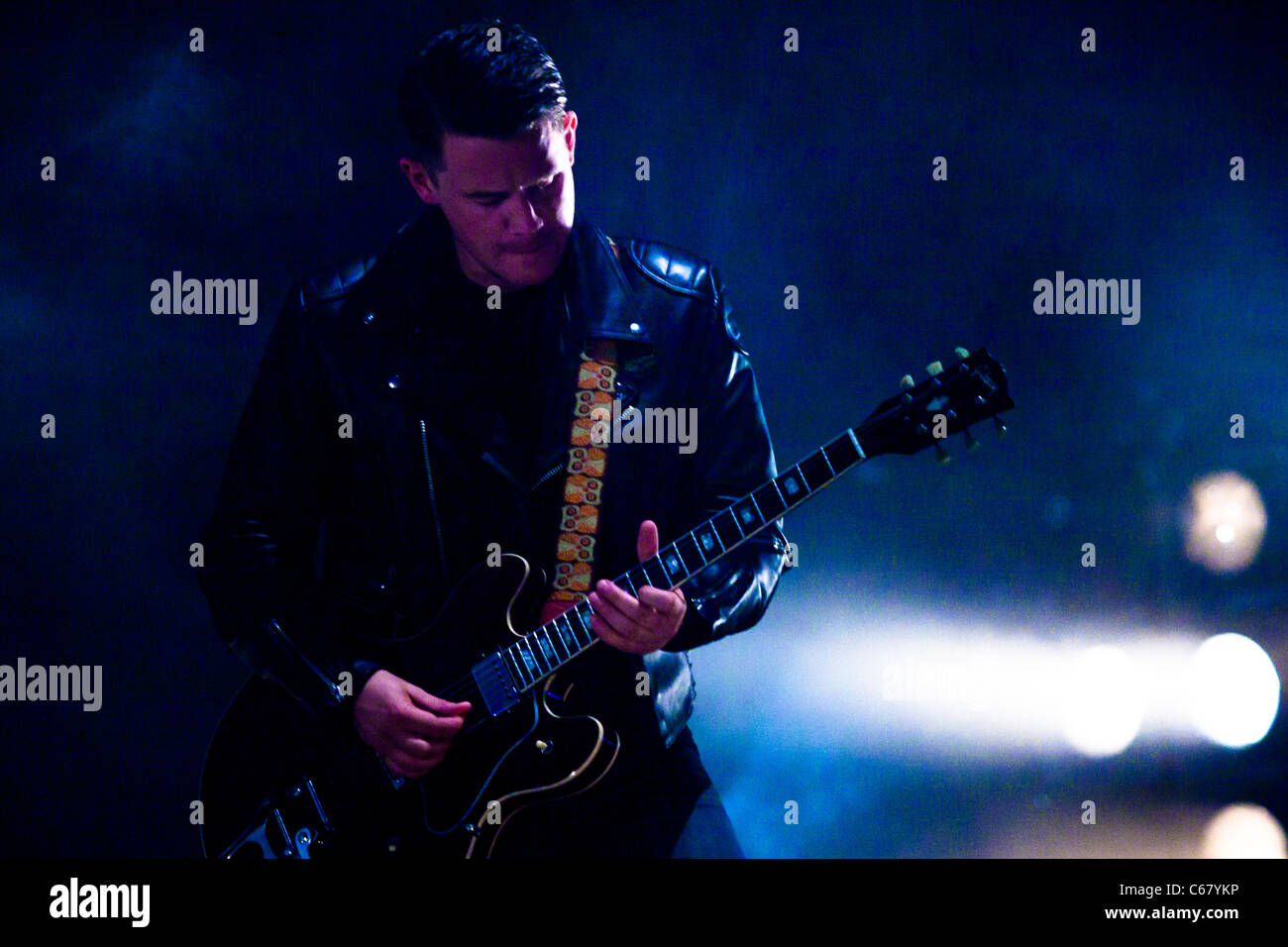 Jamie Cook from Artic Monkeys performing live on stage at Benicassim FIB Festival - July 2011 Stock Photo