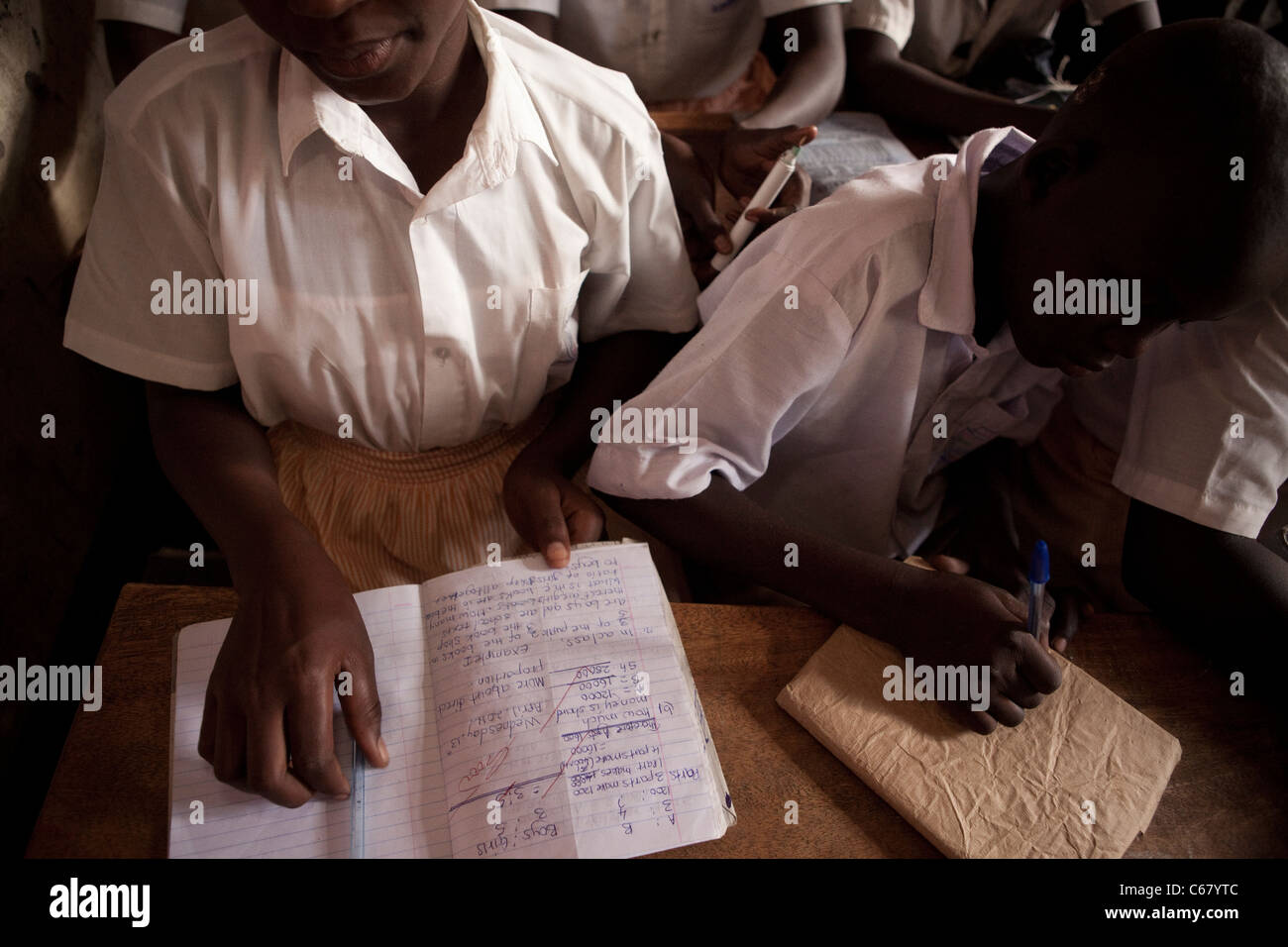 Primary school students work in a classroom in Amuria, Uganda, East Africa. Stock Photo