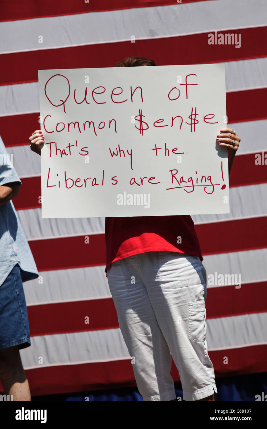 A supporter of Michelle Bachmann holds a sign during a campaign rally on August 18, 2011 in Columbia, South Carolina. Stock Photo