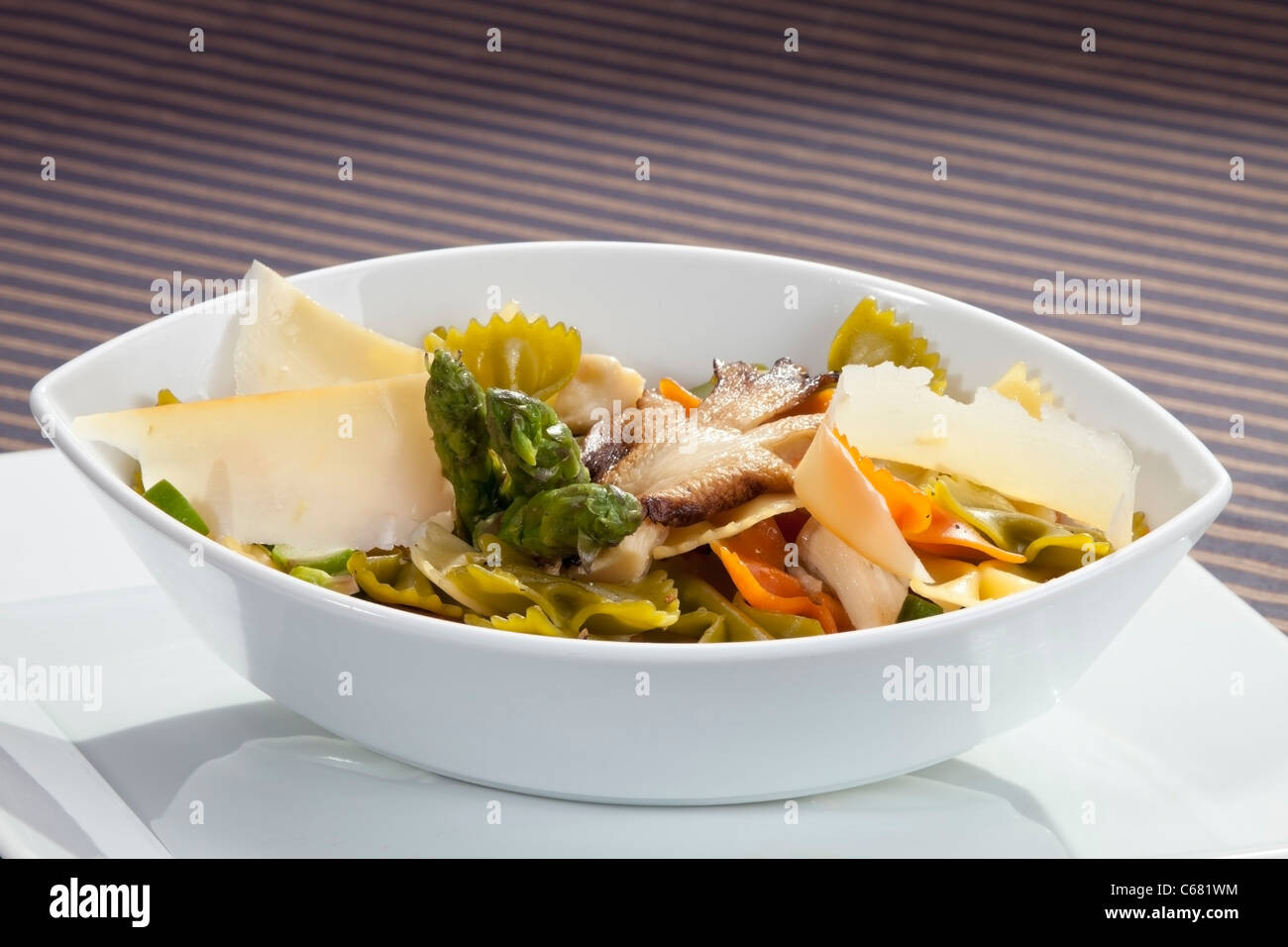 Italian pasta w asparagus, mushroom and parmesan Stock Photo