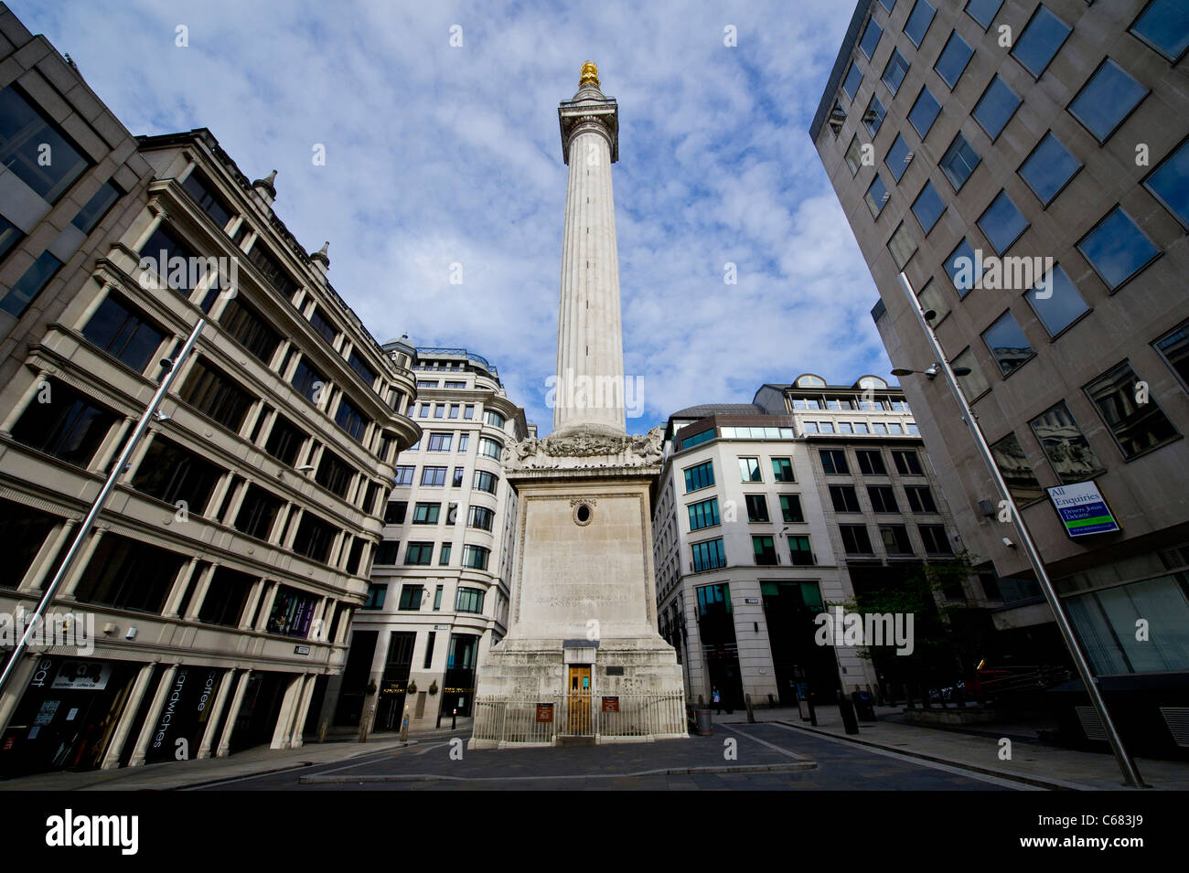 The Monument, erected near Pudding Lane where the Great fire of London in 1666 began, which is now a London tourism attraction Stock Photo