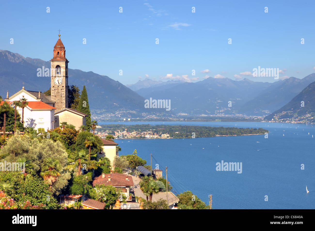 View of the Church of Ronco sopra Ascona to Ascona and Locarno and the mountains of Graubünden Stock Photo