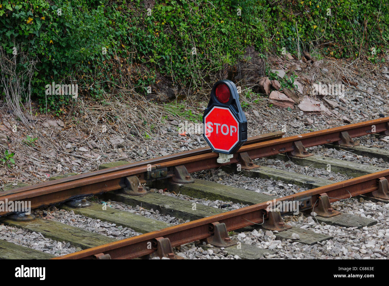 Stop sign on rail track Kingswear station Devon UK Stock Photo
