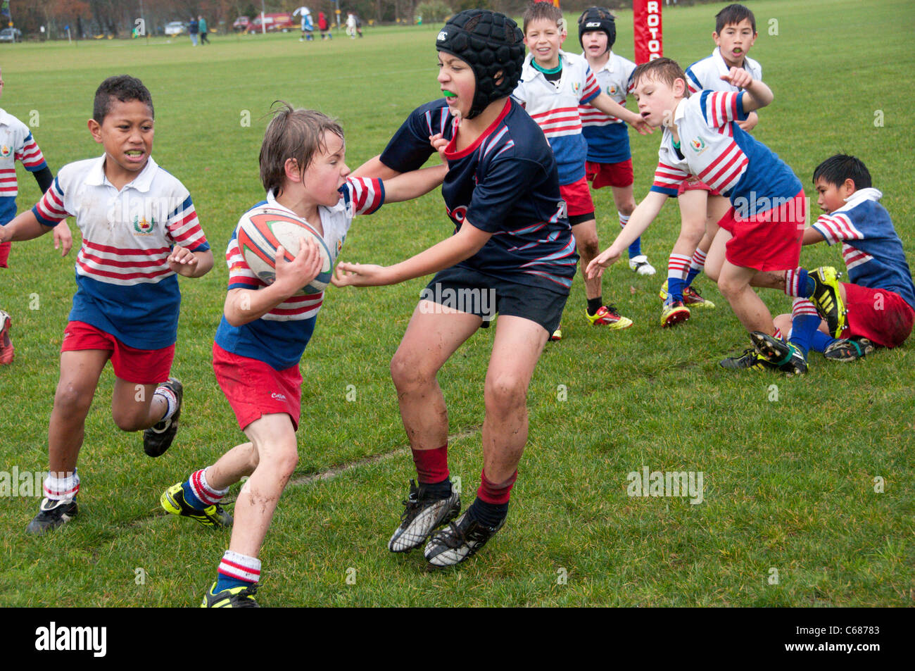 junior rugby players going for it Stock Photo