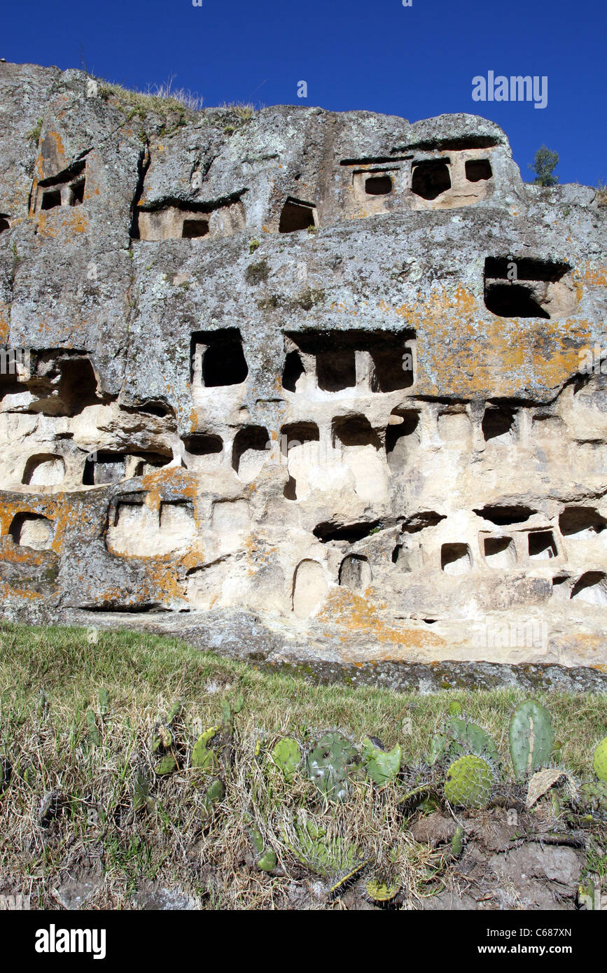 Ventanillas de Otuzco funerary complex, comprising 337 windows carved into the rock face. Cajamarca, Peru, South America Stock Photo