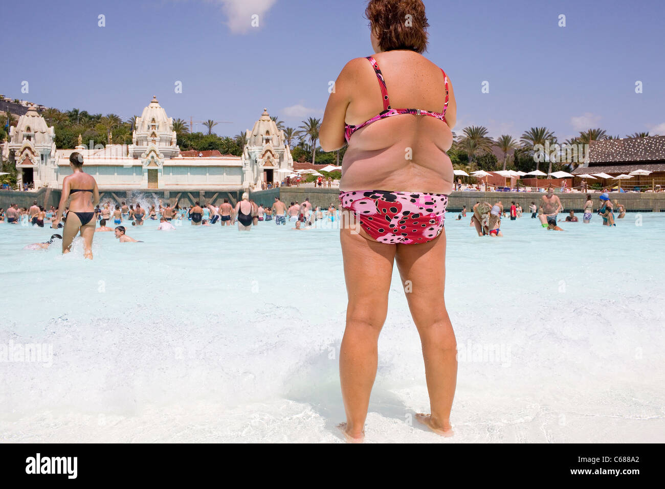 A fat woman in a bikini at Siam Park in Tenerife. Stock Photo