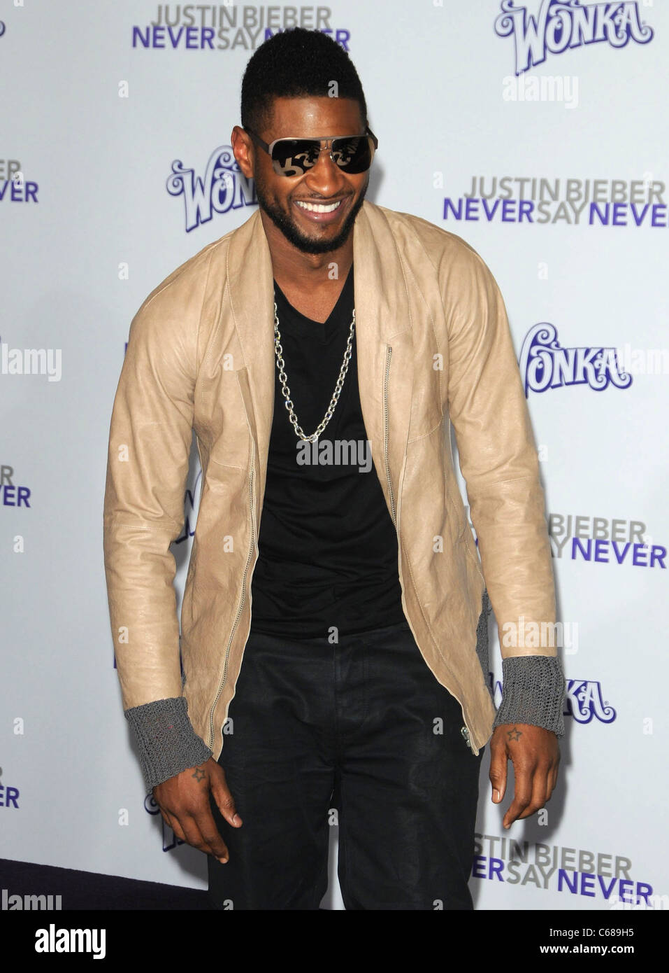 Usher at arrivals for JUSTIN BIEBER: NEVER SAY NEVER Premiere, Nokia Theatre, Los Angeles, CA February 8, 2011. Photo By: Dee Cercone/Everett Collection Stock Photo