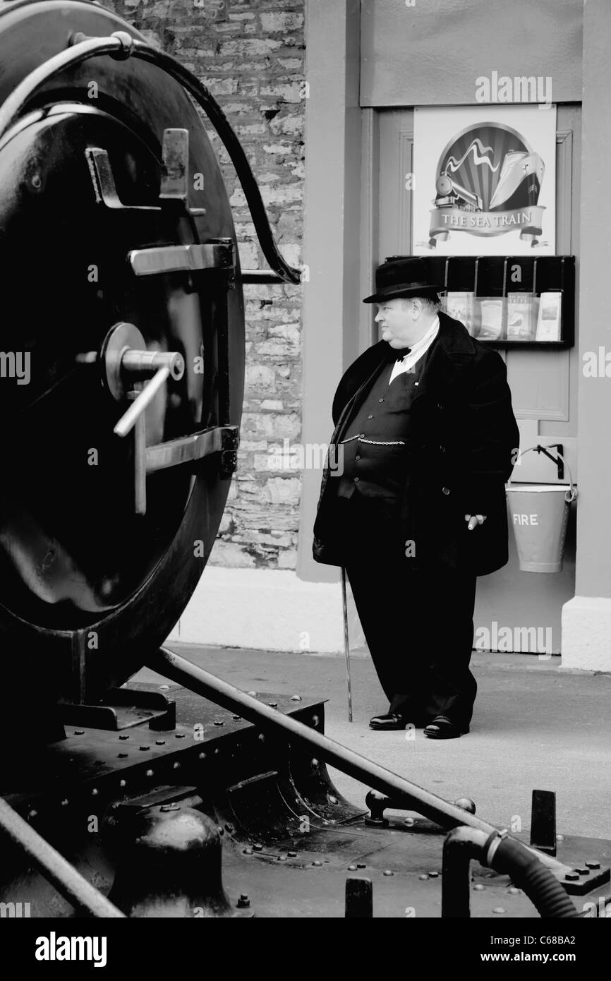 Winston Churchill re-enactor  on Churston railway station Devon UK during a 1940's weekend Stock Photo