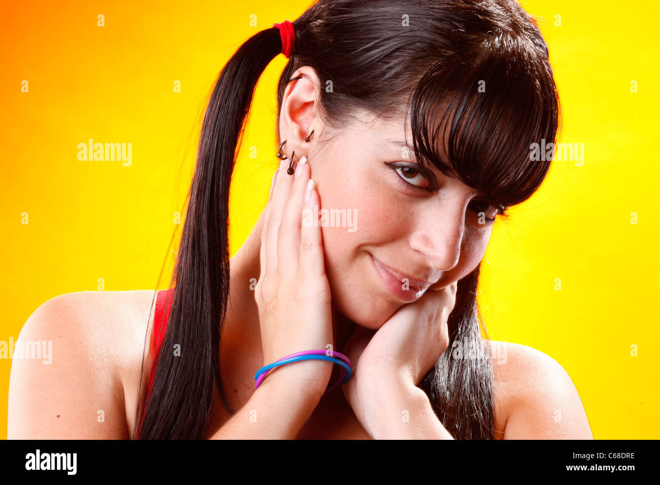 Young brunette's facial expression Stock Photo