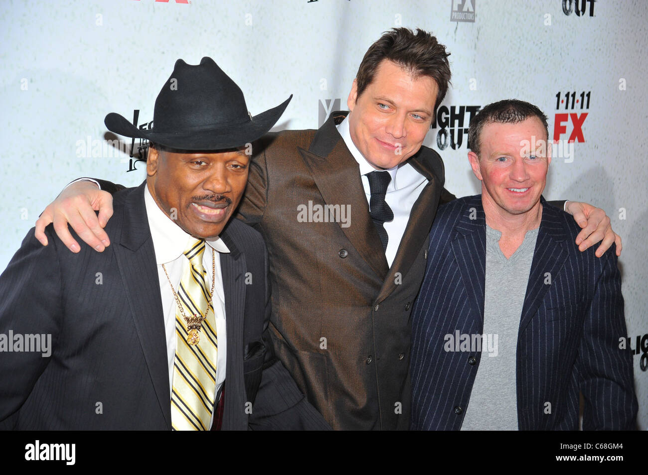 Joe Frazier, Holt McCallany, Micky Ward at arrivals for LIGHTS OUT Series Premiere on FX, Hudson Theater, New York, NY January 5, 2011. Photo By: Gregorio T. Binuya/Everett Collection Stock Photo