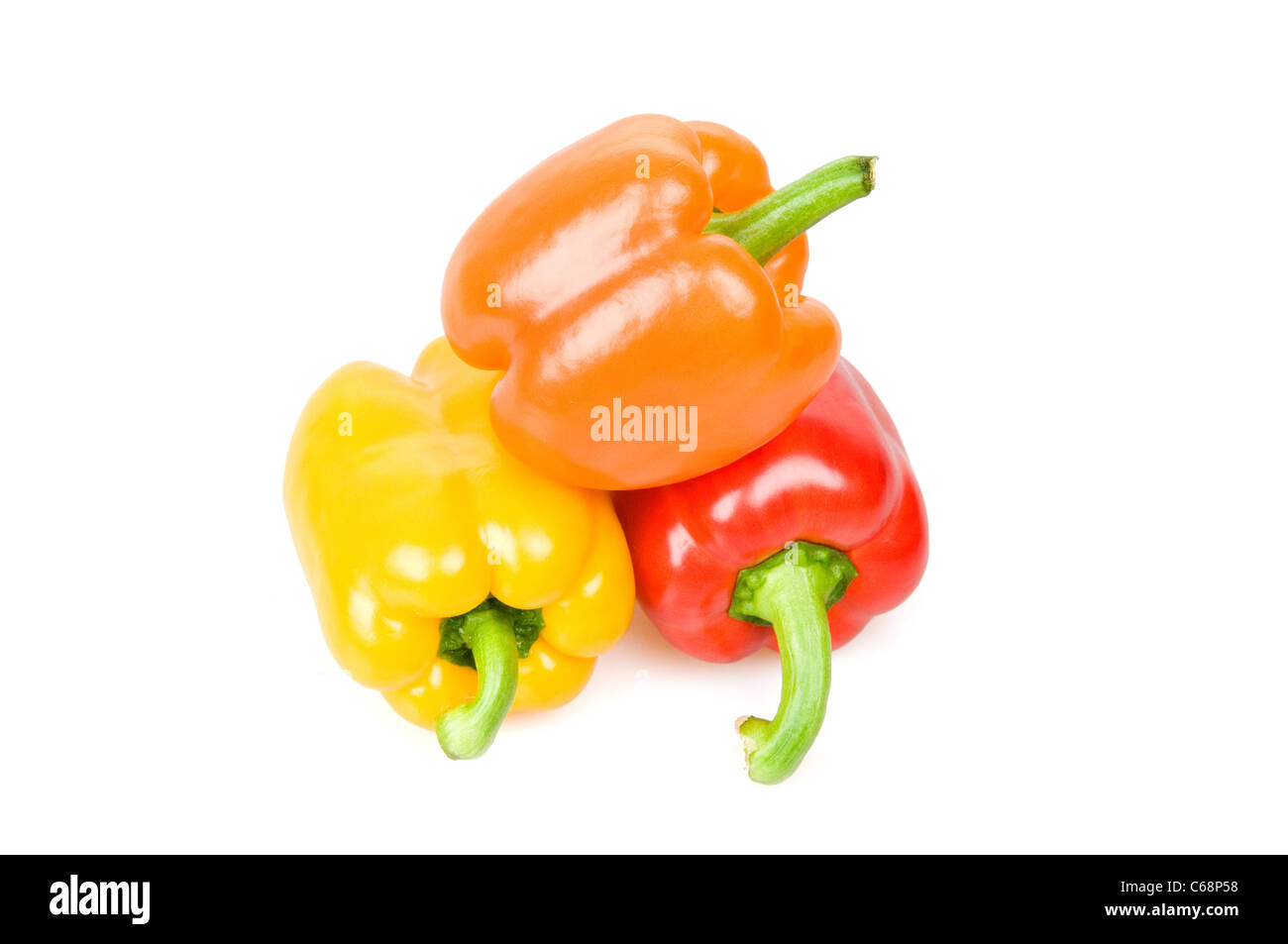 Red, yellow and orange bell peppers isolated on white Stock Photo - Alamy