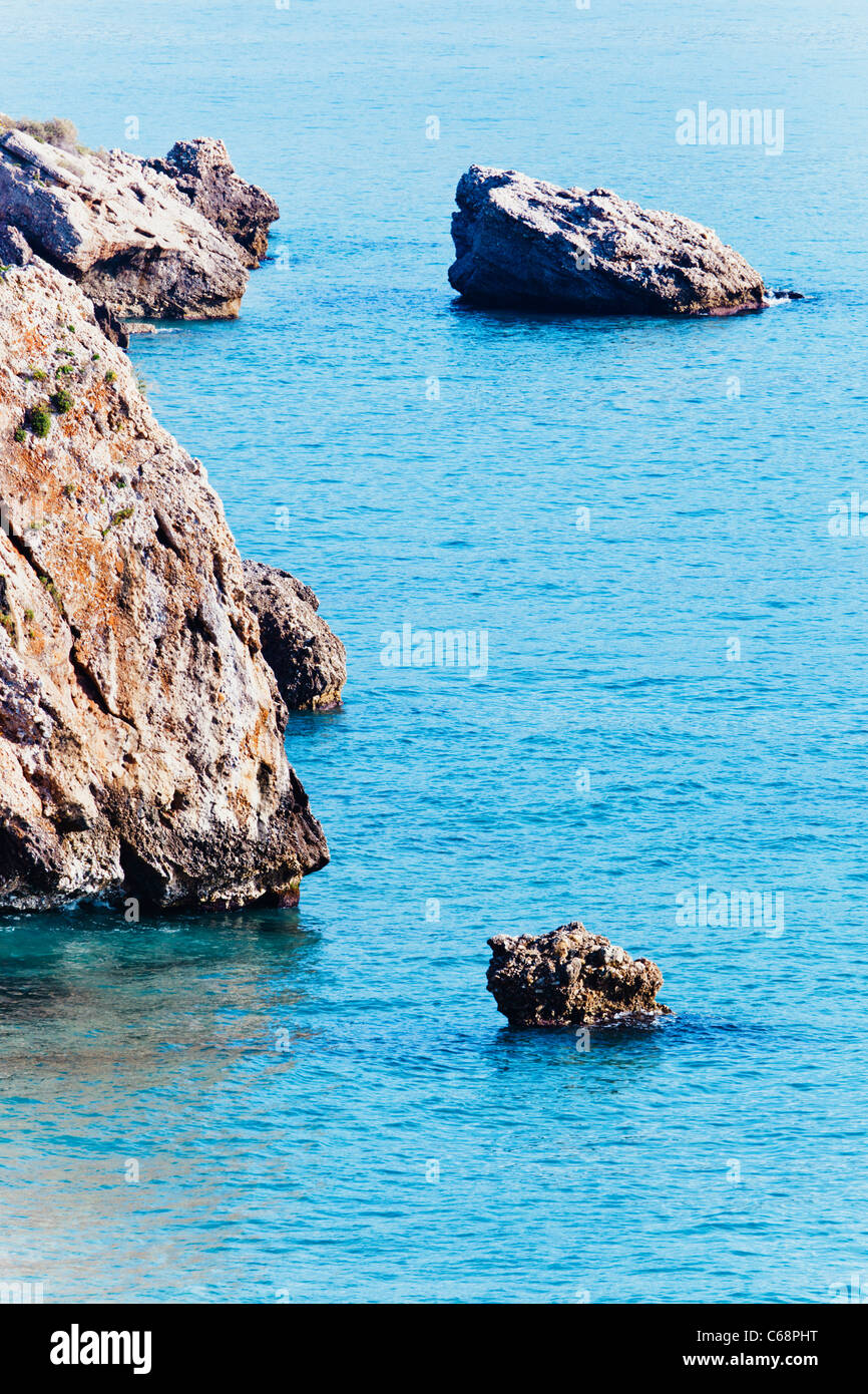 rocks-in-a-tranquil-sea-nerja-malaga-province-costa-del-sol-spain