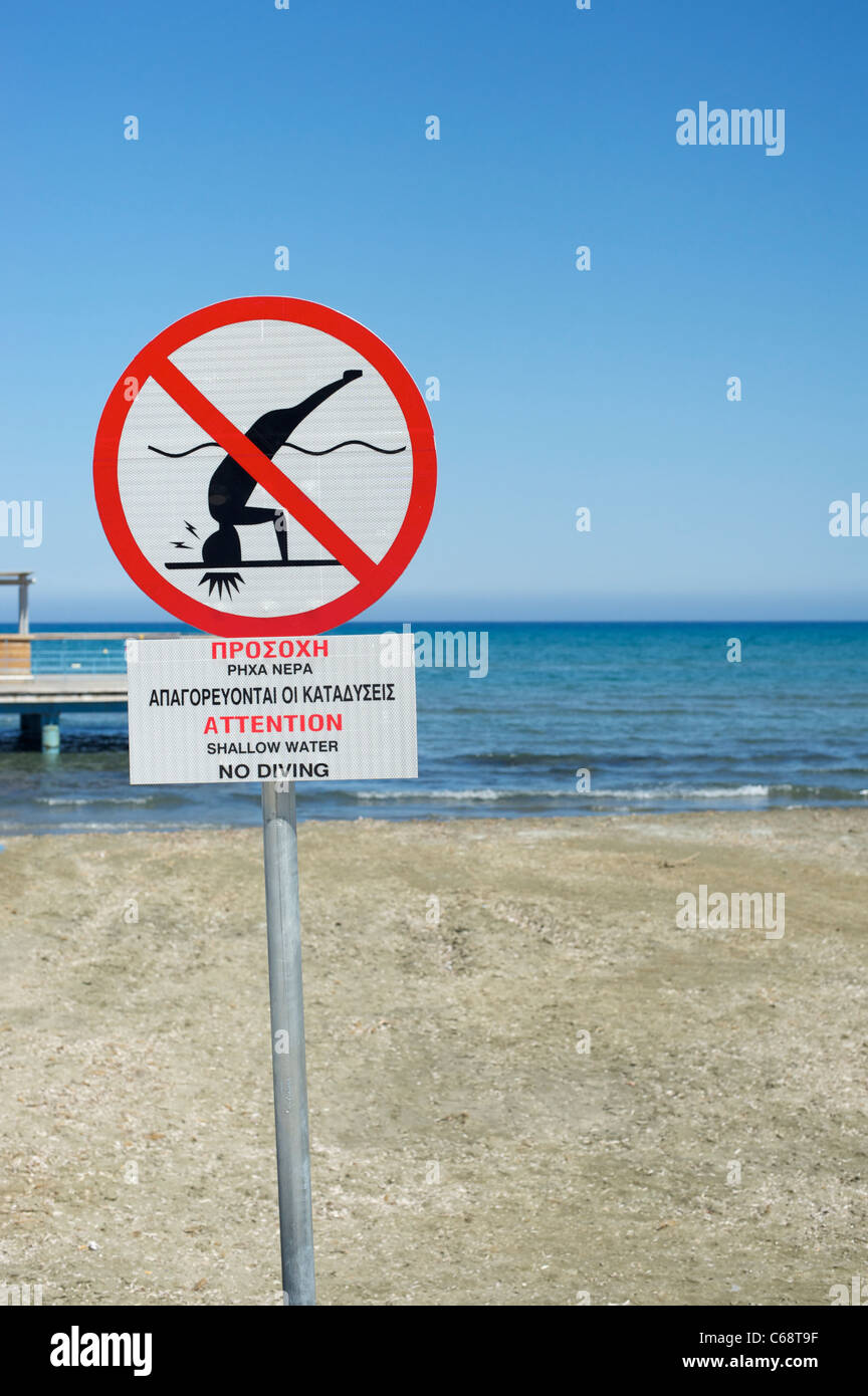Shallow water sign on the beach at Larnaca, Cyprus Stock Photo