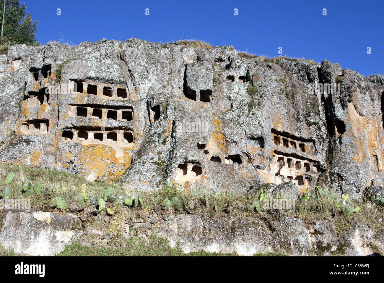 Ventanillas de Otuzco funerary complex, comprising 337 windows carved into the rock face. Cajamarca, Peru, South America Stock Photo
